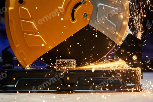 Preview: close-up of the heated edge of the abrasive disc of a cutting machine. long tracks of flying sparks
