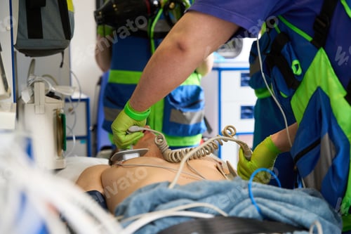 Preview: Medic resuscitates an injured man in an ambulance