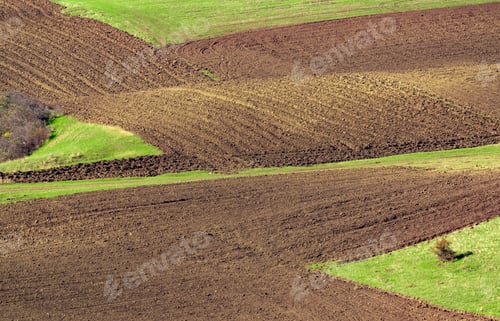 Preview: Plowed farm fields