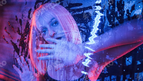 Preview: Futuristic style. Stylish woman with white hair is behind wet transparent plastic sheet