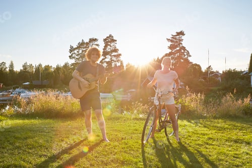 Preview: Young couple with guitar and bicycle, Gavle, Sweden