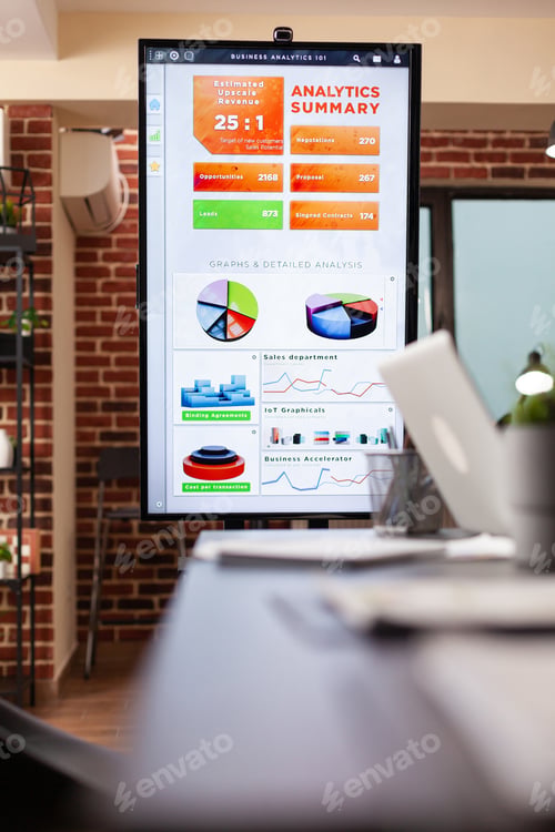 Preview: Monitor with management graph on it standing in empty startup company