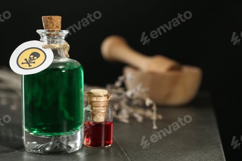 Preview: Bottles with poison on grey table. Space for text