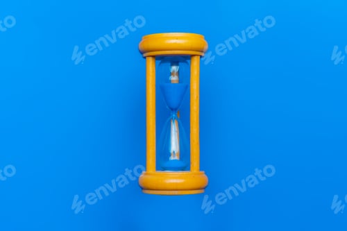 Preview: isolated classic glass and wooden hourglass on a color background s