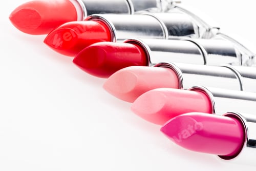 Preview: close up view of set of fashionable lipsticks isolated on white