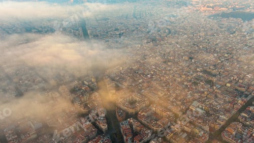 Preview: Aerial view of Barcelona City above the clouds and fog, Catalonia, Spain
