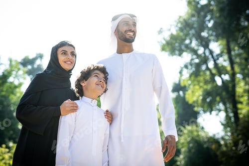 Preview: cinematic image of a family from the emirates spending time at the park