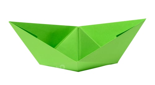 Preview: Green paper boat on a white isolated background