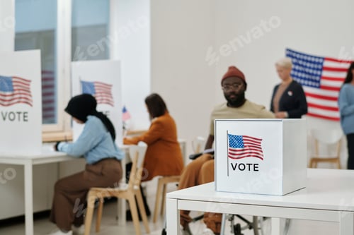 Preview: Selective focus on desk with ballot box for papers with chosen candidates