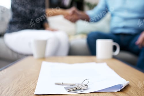 Preview: Its officially sold. Shot of two unrecognizable people shaking hands after a successful deal.
