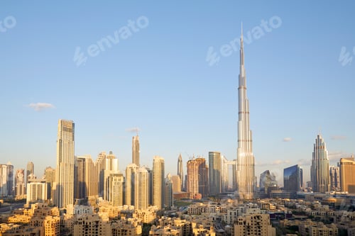 Preview: Dubai city skyline with Burj Khalifa skyscraper in a sunny day, blue sky