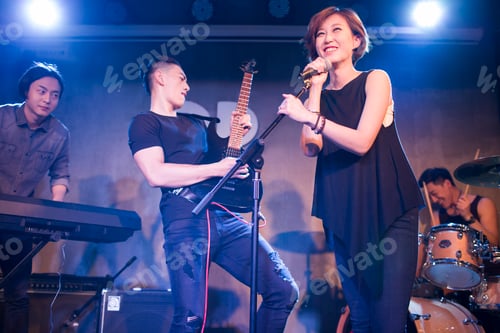 Preview: Musical band performing on stage