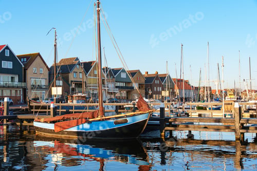 Preview: Traditional Sailboats Moored Along Dutch Harbor Houses