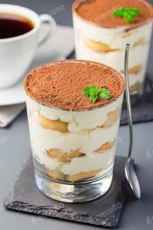 Preview: Traditional italian Tiramisu dessert cake in a glass, decorated