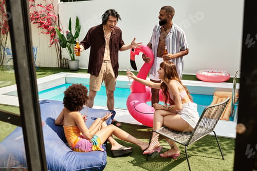 Preview: Friends celebrating joy and friendship at a lively pool party on a sunny day
