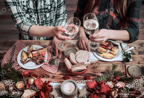 Preview: Flat-lay of friends hands eating and drinking together.