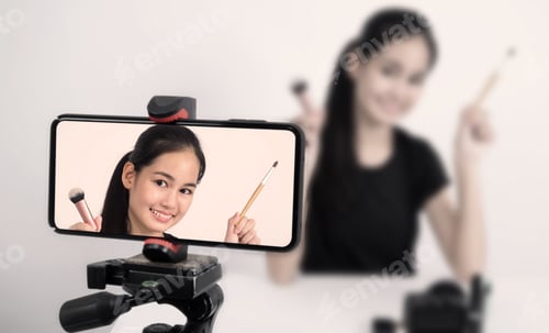 Preview: Asian teen woman sit in front of camera and live broadcasting