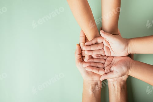 Preview: Celebrating Family Day, Top view of parents and kid holding empty hands. Embracing togetherness