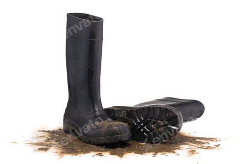 Preview: Muddy rubber fallen boots 3/4 view isolated on white background