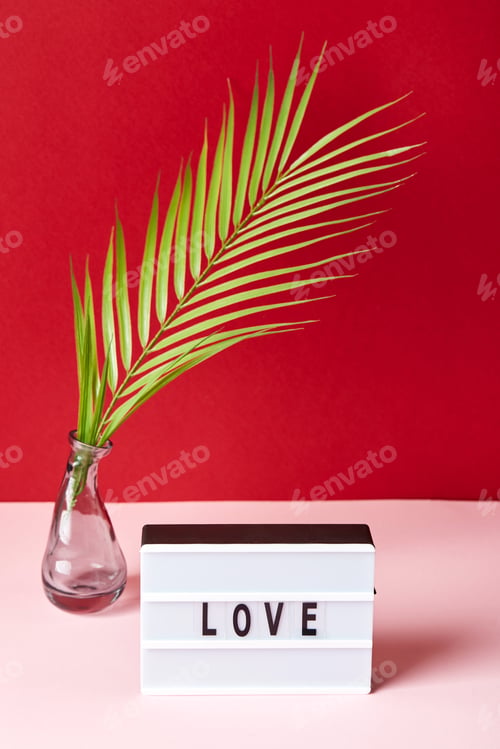 Preview: Love lightbox message with red hearts on pink and red background