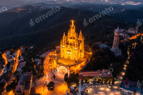 Preview: Aerial view of Barcelona skyline with Sagrat Cor temple at night, Catalonia, Spain