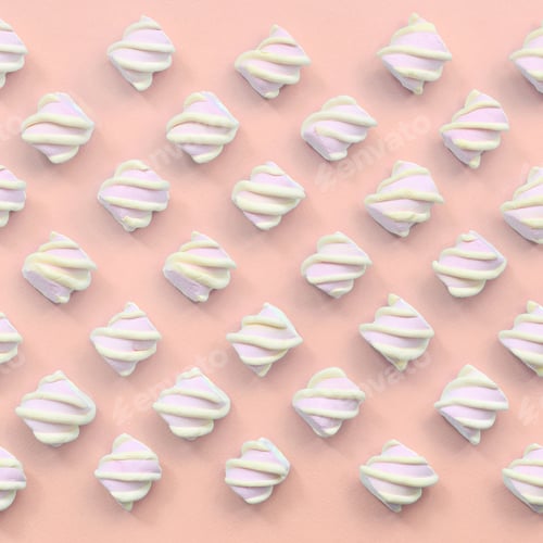 Preview: Colorful marshmallow laid out on pink paper background
