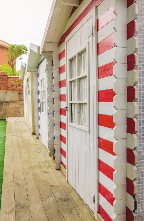 Preview: Beach striped huts in a home garden