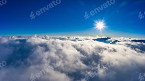 Preview: Flight through evening sky with clouds over mountain
