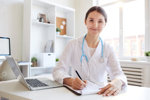 Preview: Woman Doctor Posing at Workplace