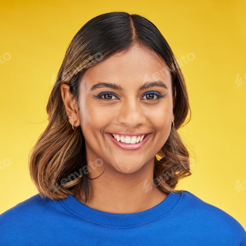 Preview: Portrait, smile and makeup with a woman on a yellow background in studio for fashion or cosmetics.