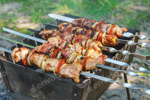 Preview: Grilled Pieces Of Meat On Skewers, Shish Kebab With Vegetables, Cooking Process On Brazier