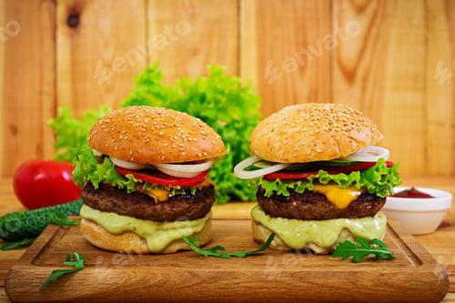 Preview: Delicious handmade burger on wooden background. Close view