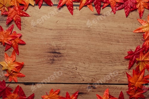 Preview: Autumn season concept. Colorful Autumn maple leaves on wooden background.