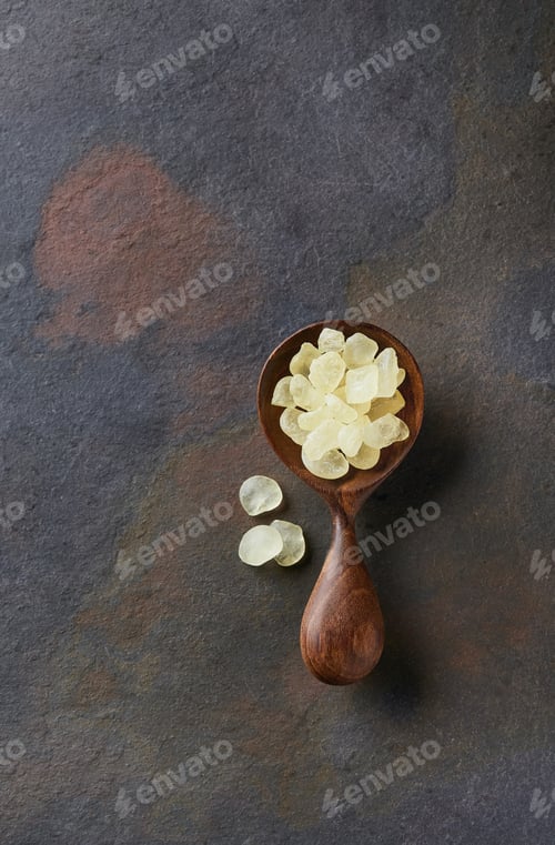 Preview: Mastic tears of Chios island on gray graphite background