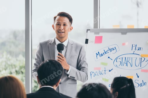 Preview: Businessman is explaining works to officers while training together at the office.