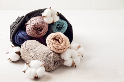 Preview: Craft hobby background with yarn in natural colors