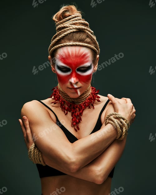 Preview: fashion portrait of pretty young woman with creative make up like a animal, fashion victim. Animal