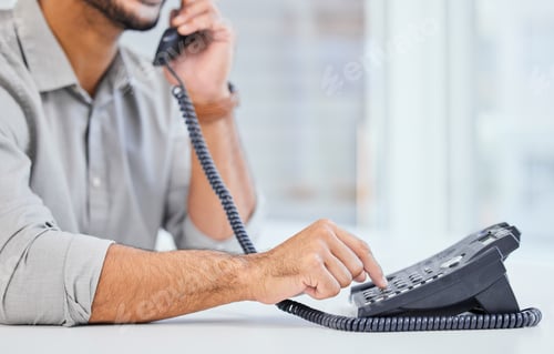 Preview: Hi there Id like to order some food. Shot of a businessman using a telephone to make a call.