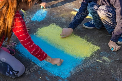 Preview: Children draw the flag of Ukraine. Selective focus.