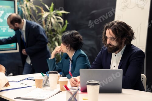 Preview: Marketing team meeting in an information sharing conference to review updates