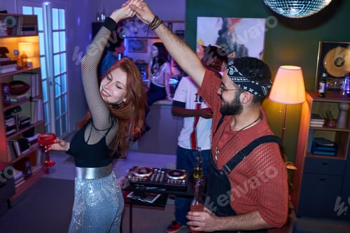 Preview: Young Woman Dancing with young Middle Eastern Man at House Party