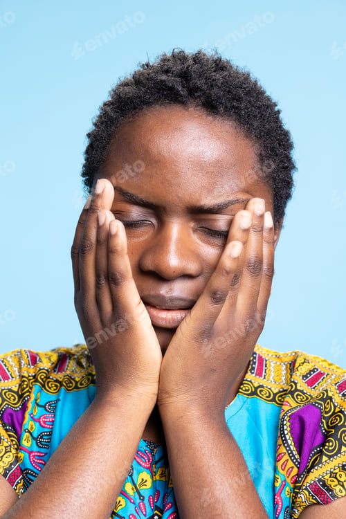 Preview: African American woman enduring weakness and symptoms of the flu
