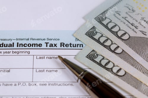Preview: Economic stimulus tax 1040 form and US 100 dollar bills currency