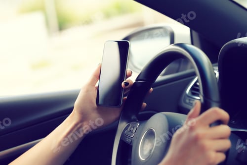 Preview: driver with a cell phone