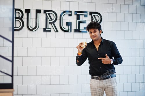 Preview: Indian man at fast food cafe