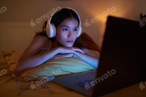 Preview: Woman Watching Documentary on Laptop