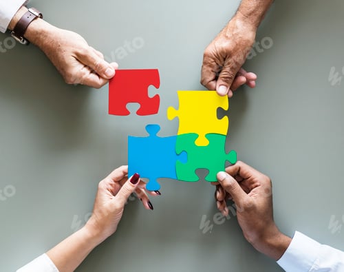 Preview: Business teamwork cooperation jigsaw isolated