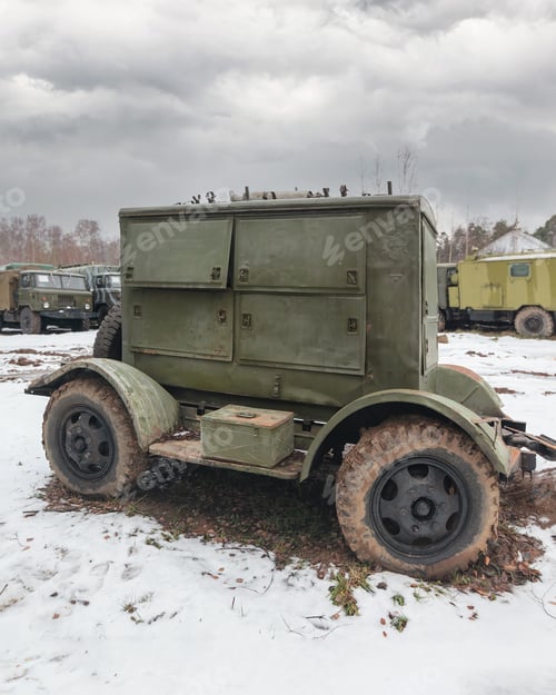 Preview: Mobile army diesel power generator abandoned along with military equipment in the snow.