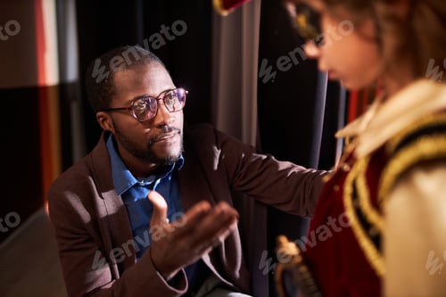 Preview: Caring Drama Teacher Talking to Boy