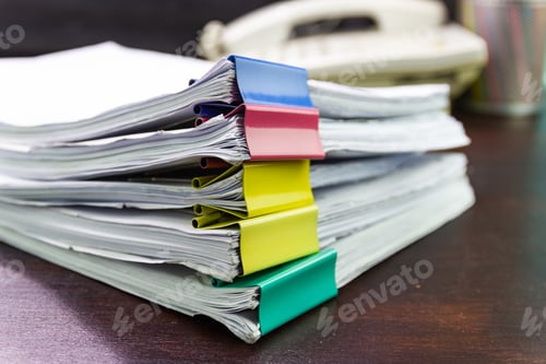 Preview: file folder and Stack of business report paper file on the table in a work office